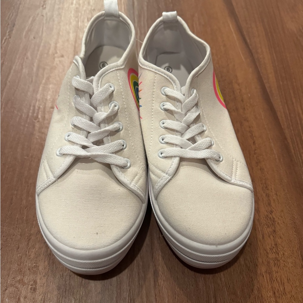 White sneakers with rainbows and sunshine